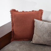 Nyla fringed cushion rust 40% Off