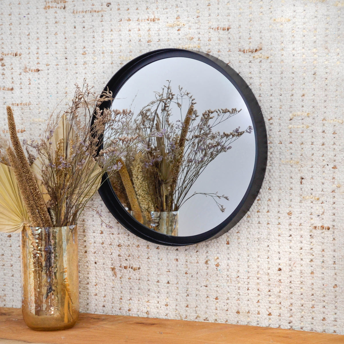 Ebony round mirror