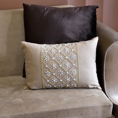 Holly embellished cushion